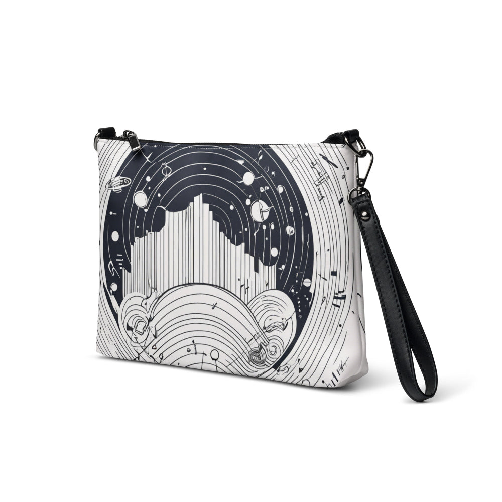 A sleek black-and-white crossbody bag featuring an abstract geometric design with concentric circles, fine lines, and modern artistic elements—perfect for bold fashion statements and everyday wear