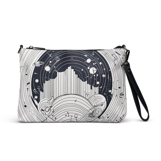 A black-and-white crossbody bag featuring an abstract celestial-inspired design with circular and linear patterns, black strap, and a modern aesthetic—perfect for everyday style and statement looks