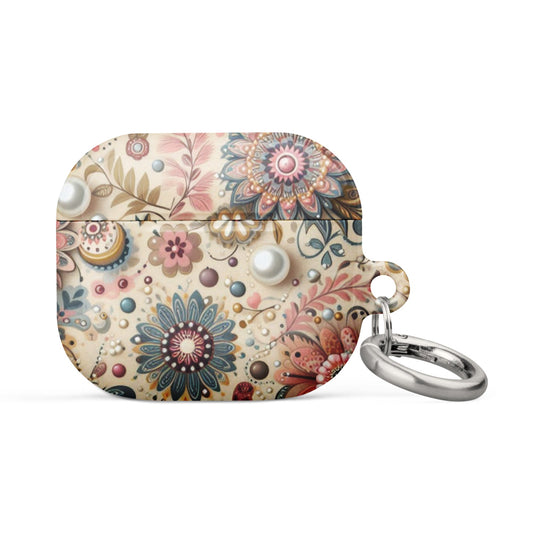 A stylish AirPods case featuring an all-over floral and abstract design in shades of pink, blue, and beige, accented with a metal ring attachment—perfect for stylish and practical everyday use